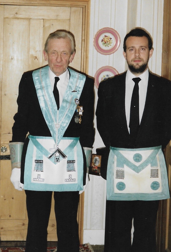 A picture of Paul and his proposer both dressed in masonic regalia
