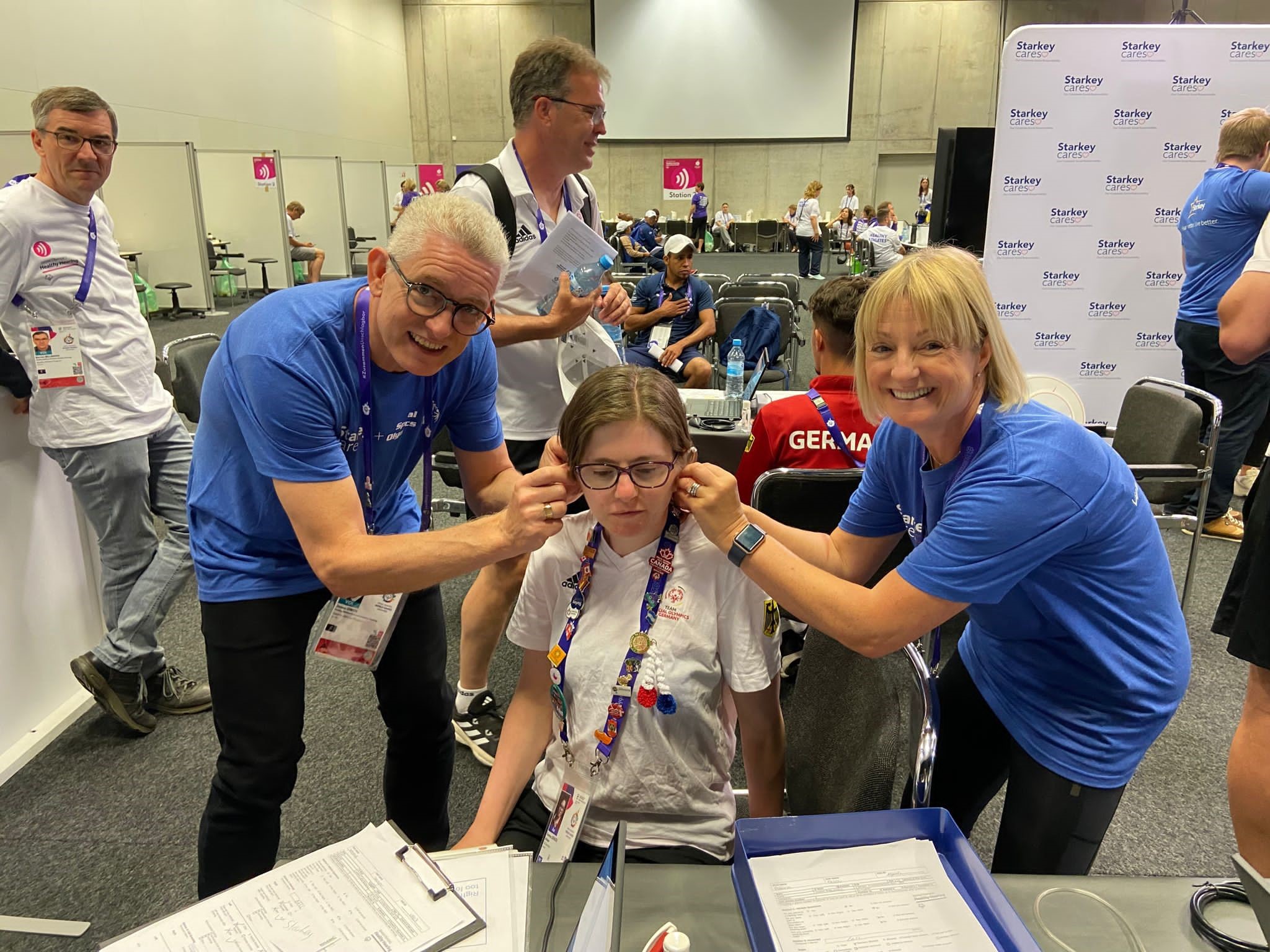 James with Jayne Bryce – another audiologist, from Scotland – fitting a German Athlete