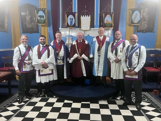 Members of St George Abadan Chapter dressed in their Chapter Regalia.