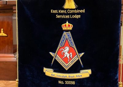 The Lodge crest proudly displayed on the WM pedestal.