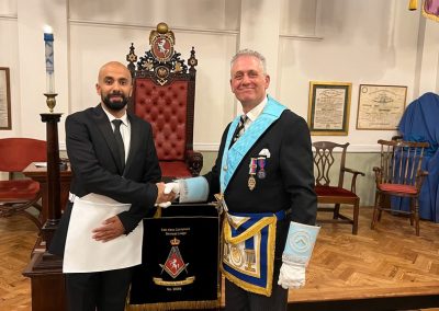 The Worshipful Master Steve Simmons welcomes our newly made Brother, Rupesh Pabari