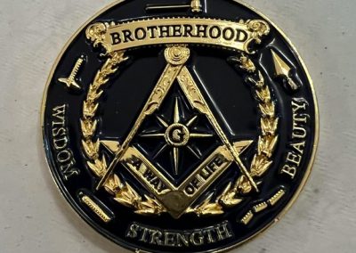 The challenge coin, for all mebers of the lodge, reverse side