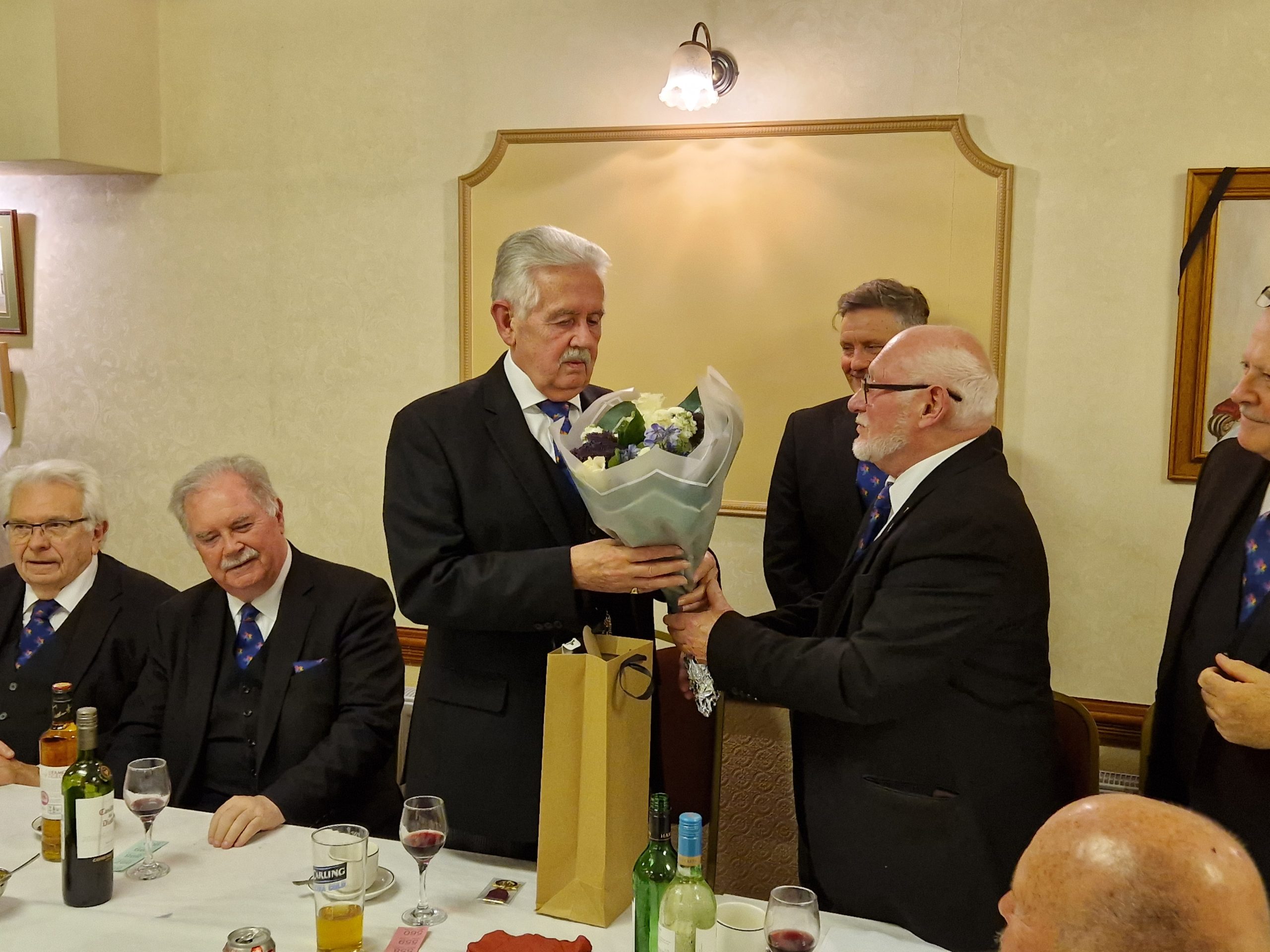 Castle Chapter No. 1436 centenary warrant MEGS presented with flowers