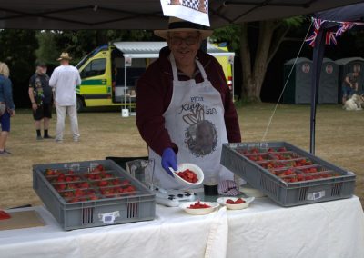Peter King of the BBQ with delicious Strawberries