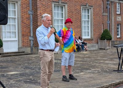 PGM opens the Garden Party, with Miki Smith looking on