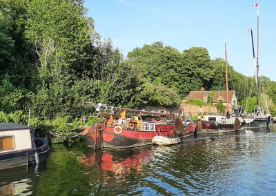 Some of the various vessels on the river