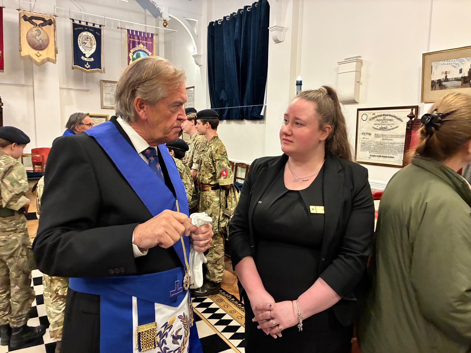 Assistant Provincial Grand Master Wayne Smith Speaking with on eof the cadets' parents.