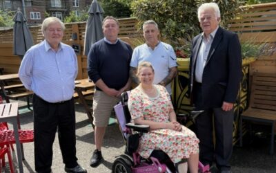 Barbara receives a new wheelchair, with thanks to East Kent Masons